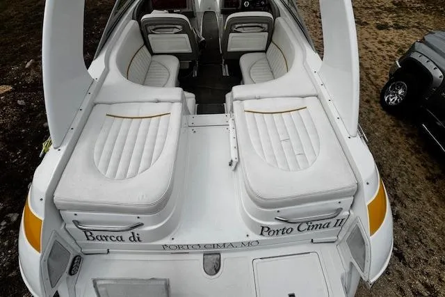 Slide: The Image of 2002 Cobalt 262 boat with white leather seating, docked at Porto Cima, MO. - 32