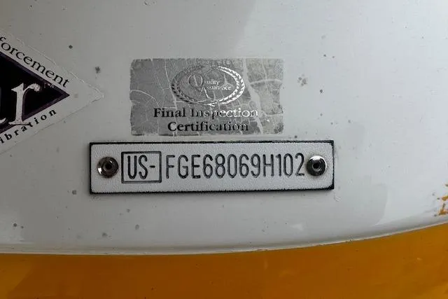 Slide: The Image of 2002 Cobalt 262 boat inspection certification with serial number plate. - 34