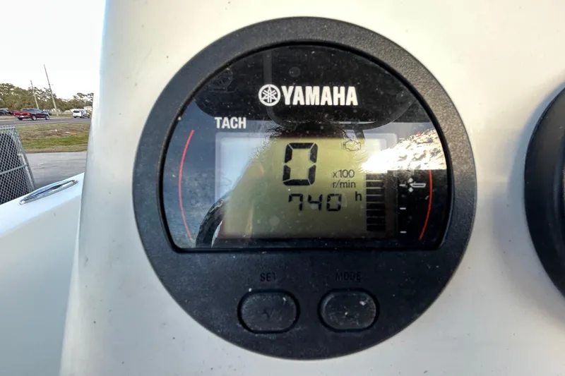 Slide: The Image of Yamaha tachometer on 2016 NauticStar 25 XS boat showing 740 hours. - 22