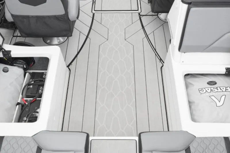 Slide: The Image of 2025 Yamaha Boats 255XE interior with sleek, modern design and advanced storage features. - 2