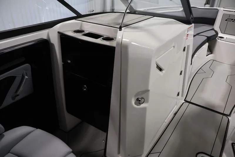 Slide: The Image of 2026 Yamaha Boats 255XE interior, featuring sleek seating and modern design elements. - 28