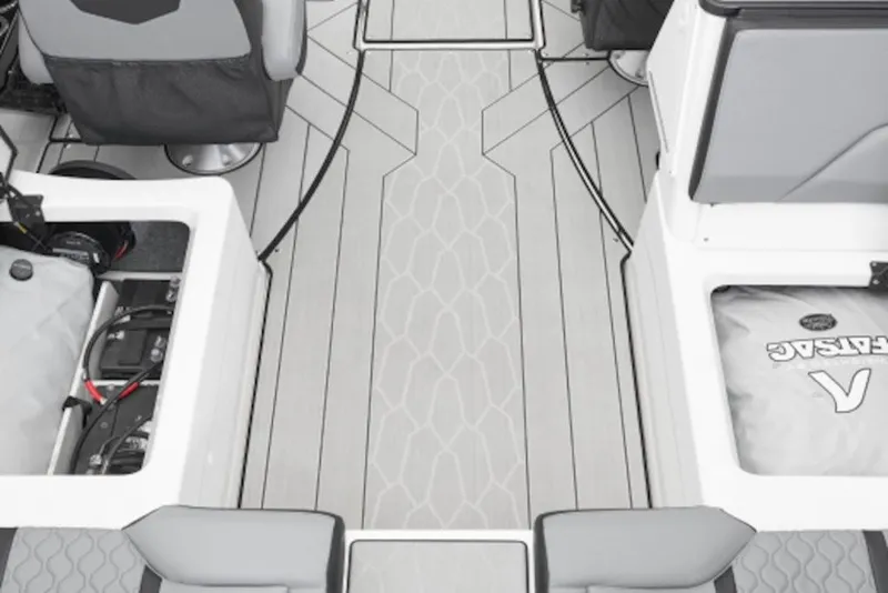 Slide: The Image of 2026 Yamaha Boats 255XE interior with sleek, modern design and spacious seating. - 15