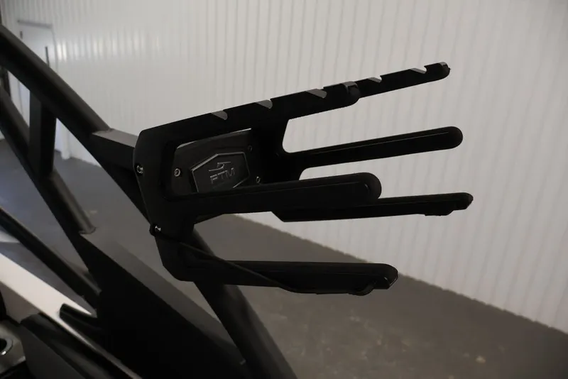 Slide: The Image of Close-up of 2026 Yamaha Boats 255XE wakeboard rack in a sleek, modern design. - 29