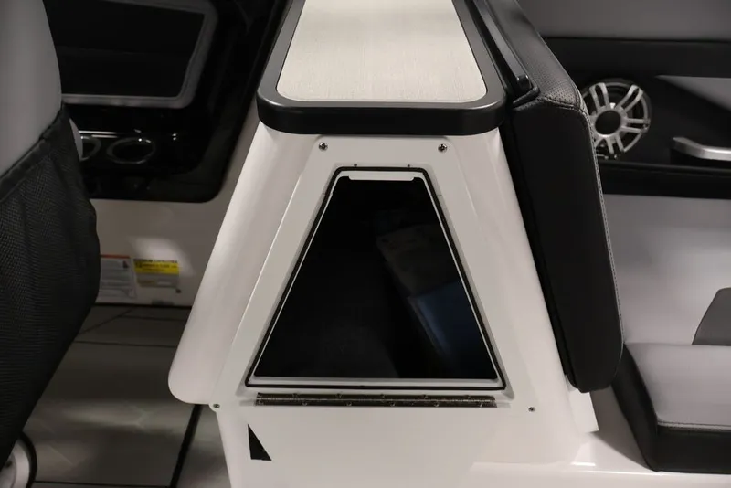 Slide: The Image of Interior view of 2026 Yamaha Boats 255XE, featuring sleek seating and modern design elements. - 24