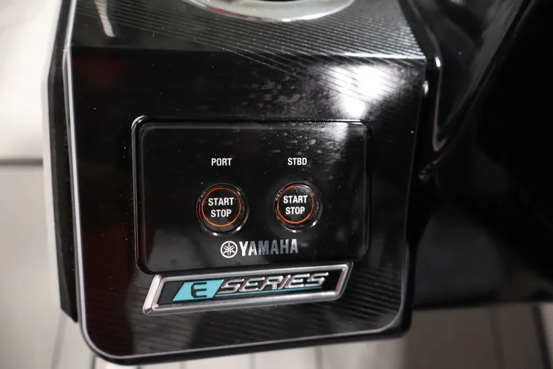 Slide: The Image of Control panel of 2026 Yamaha Boats 255XE with start/stop buttons for port and starboard. - 25
