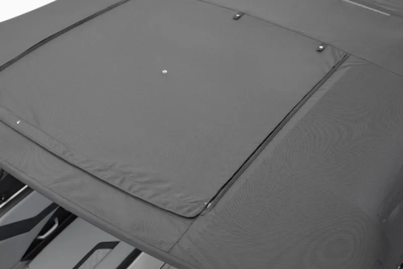 Slide: The Image of 2026 Yamaha Boats 255XE with a sleek, protective cover. - 5