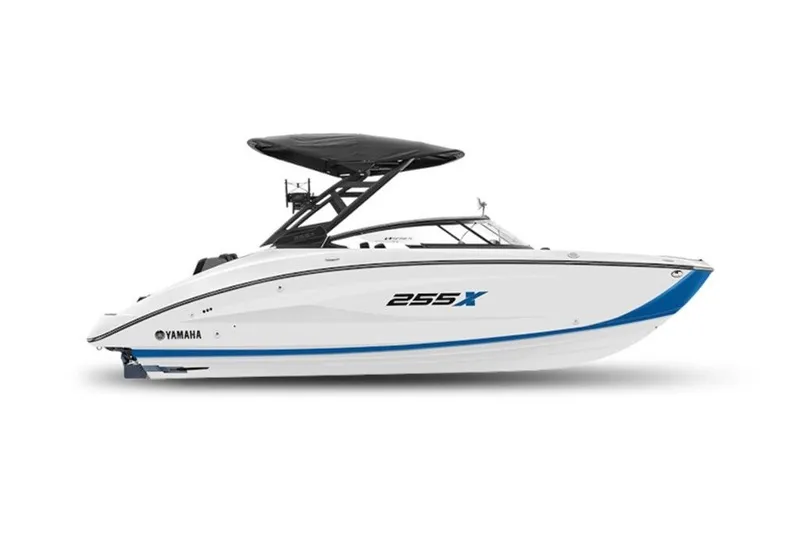 Slide: The Image of 2026 Yamaha Boats 255XE, sleek white design with blue accents and black canopy. - 13