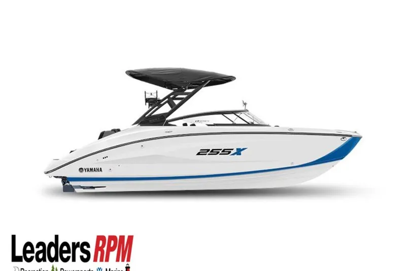 Slide: The Image of 2026 Yamaha Boats 255XE, sleek white design with blue accents, side view. - 4