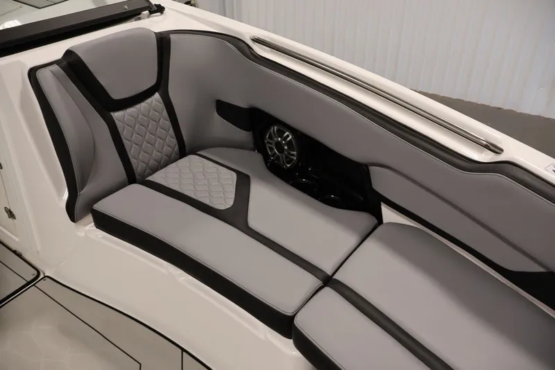 Slide: The Image of 2026 Yamaha Boats 255XE interior seating with sleek gray and black upholstery design. - 32