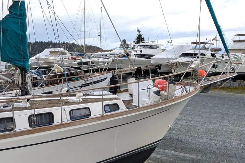 Slide: The Image of 1985 Siltala Nauticat 44 sailboat docked among other yachts in a marina. - 3