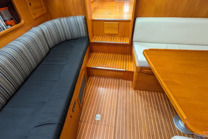 Slide: The Image of Interior of 1985 Siltala Nauticat 44 yacht with wooden flooring and seating. - 43
