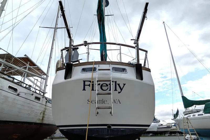 Slide: The Image of 1985 Siltala Nauticat 44 sailboat named "Firefly" docked in Seattle, WA. - 5