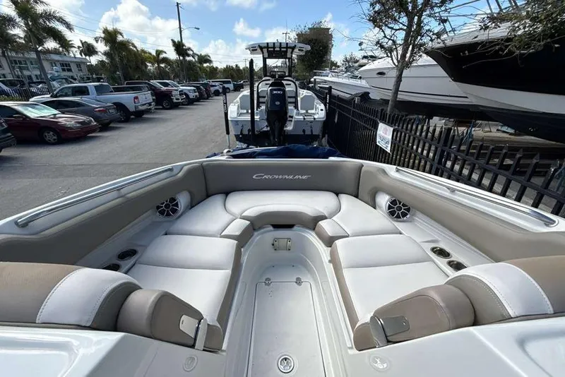 Slide: The Image of 2021 Crownline 255 XSS boat interior with spacious seating and modern design. - 26