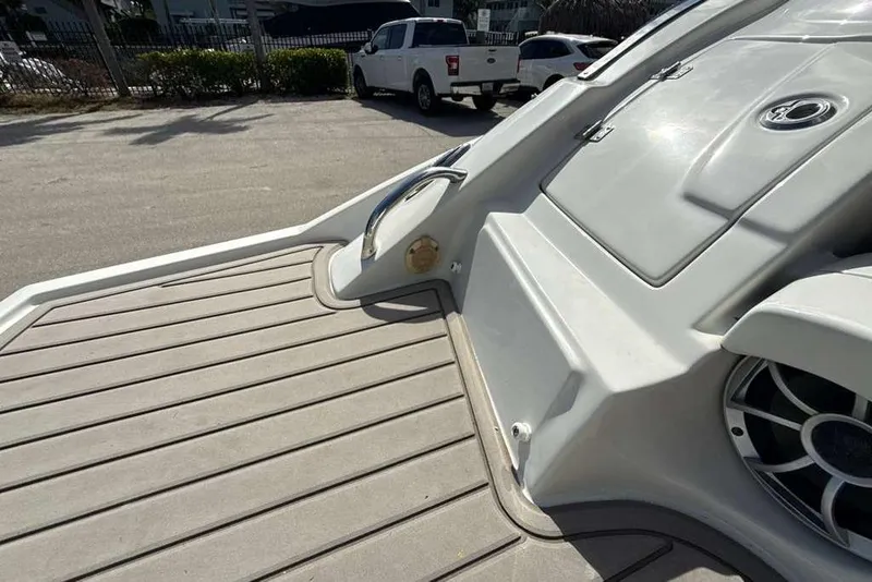 Slide: The Image of 2021 Crownline 255 XSS boat deck with sleek design and modern features. - 8