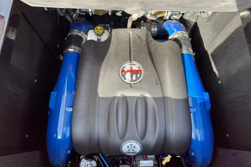 Slide: The Image of 2020 MasterCraft XStar engine with Ilmor branding, featuring blue components. - 22