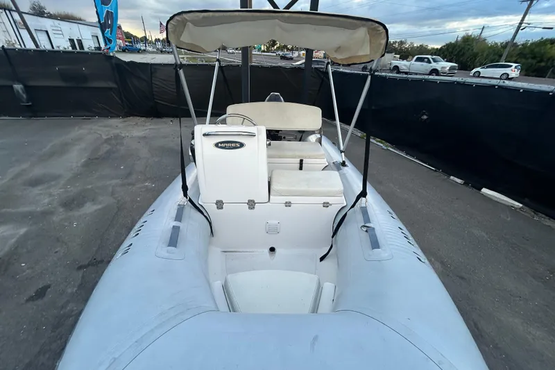 Slide: The Image of 2021 AB Inflatables Mares 10 VSX boat with canopy, parked on pavement. - 17