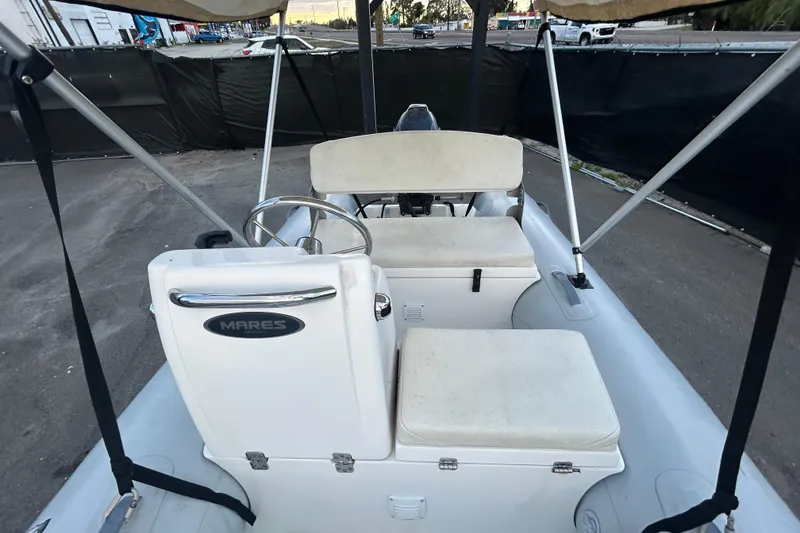 Slide: The Image of 2021 AB Inflatables Mares 10 VSX boat interior with seating and steering wheel. - 18