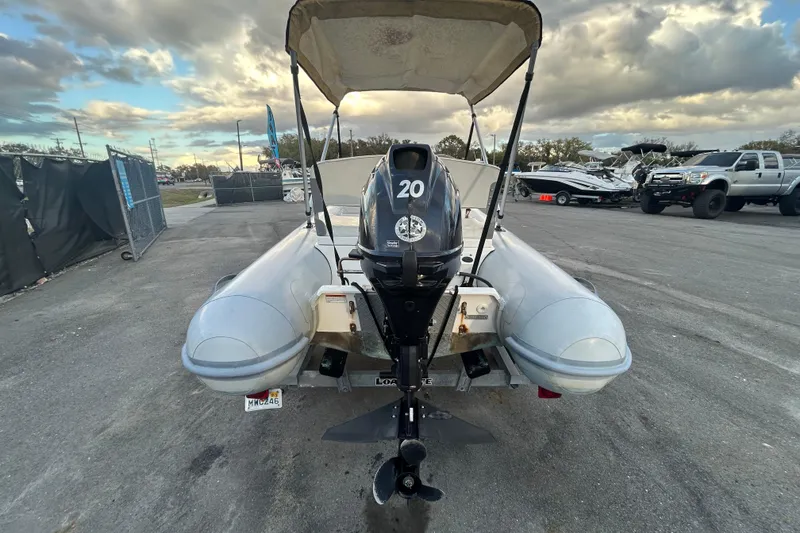 Slide: The Image of 2021 AB Inflatables Mares 10 VSX boat with outboard motor, parked outdoors. - 3