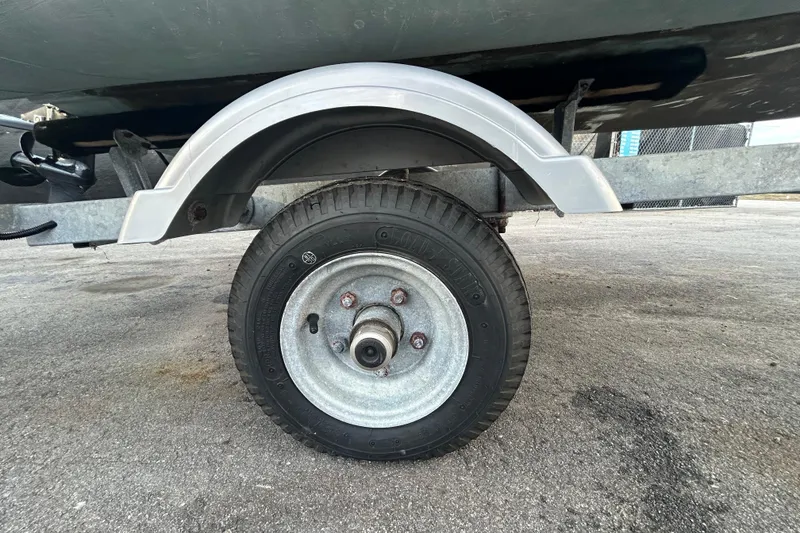 Slide: The Image of Trailer wheel of 2021 AB Inflatables Mares 10 VSX on pavement. - 37