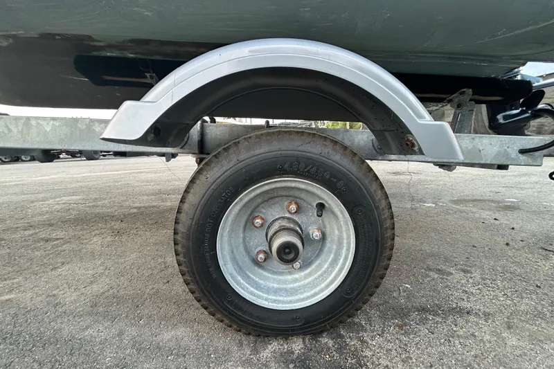 Slide: The Image of Trailer wheel of 2021 AB Inflatables Mares 10 VSX on pavement. - 38