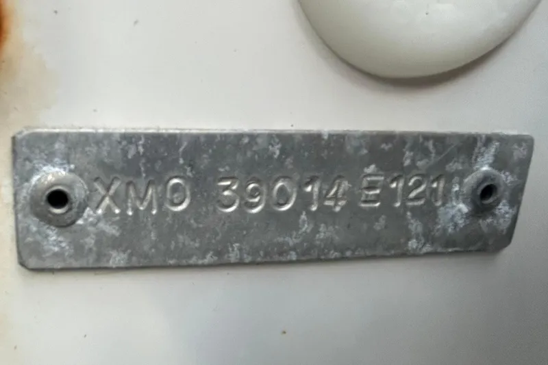 Slide: The Image of 2021 AB Inflatables Mares 10 VSX boat identification plate with visible rust stains. - 39