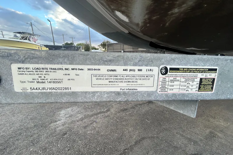 Slide: The Image of Trailer label for Load Rite Trailers, model 14F800WT, with tire and loading information. - 40