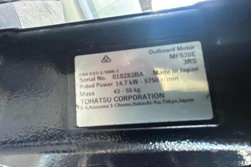 Slide: The Image of Tohatsu outboard motor nameplate, model MFS20E, serial number 018283BA. - 41