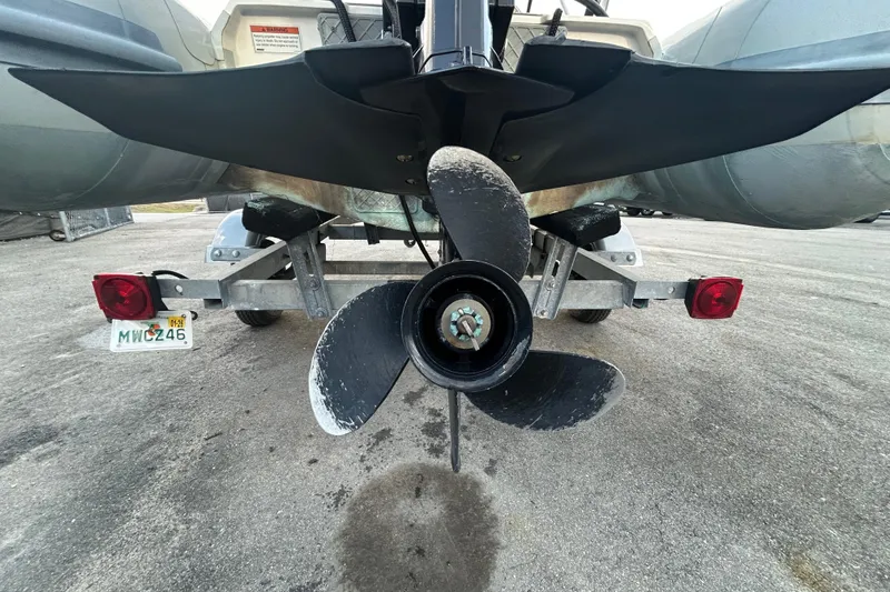 Slide: The Image of 2021 AB Inflatables Mares 10 VSX boat propeller and trailer close-up. - 6