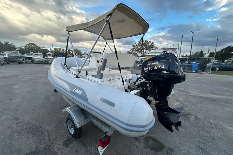 Slide: The Image of 2021 AB Inflatables Mares 10 VSX boat with Tohatsu outboard motor on trailer. - 7
