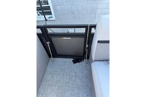 Slide: The Image of 2023 Angler Quest 8522 All Sport interior with seating and gate detail. - 11