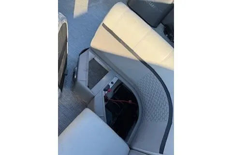 Slide: The Image of 2023 Angler Quest 8522 All Sport boat interior seating with storage compartment. - 15