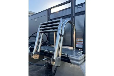 Slide: The Image of 2023 Angler Quest 8522 All Sport boat ladder and deck detail. - 3