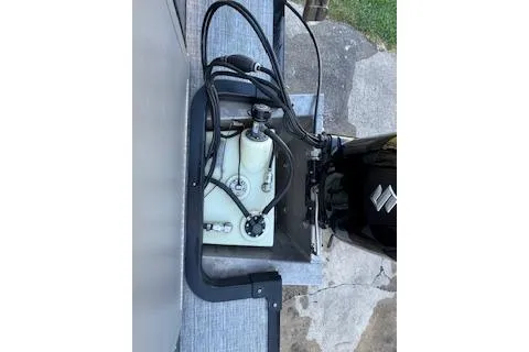 Slide: The Image of 2023 Angler Quest 8522 All Sport boat engine and fuel system components. - 30