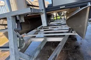 Slide: The Image of 2023 Angler Quest 8522 All Sport boat on a trailer, underside view. - 6