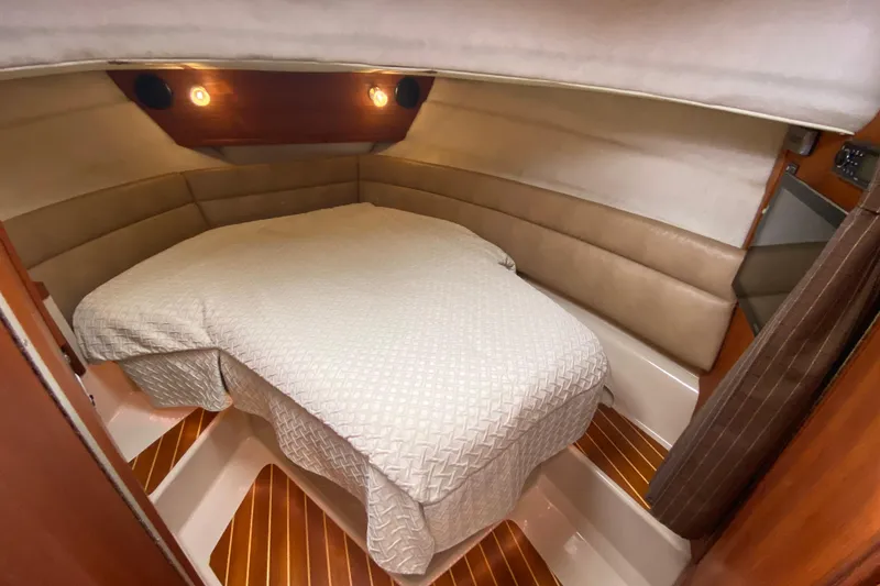 Slide: The Image of Cozy cabin interior of 2010 Ranger Tugs R-29 with comfortable bedding. - 20