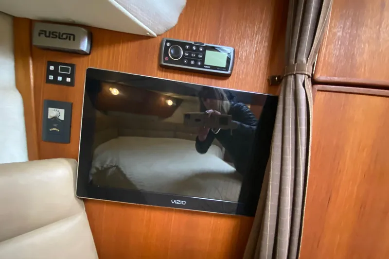 Slide: The Image of Interior of 2010 Ranger Tugs R-29 with Vizio TV and Fusion audio system. - 22