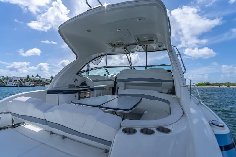 Slide: The Image of 2022 Formula 40 Performance Cruiser, luxurious deck with seating, on a sunny day at sea. - 22