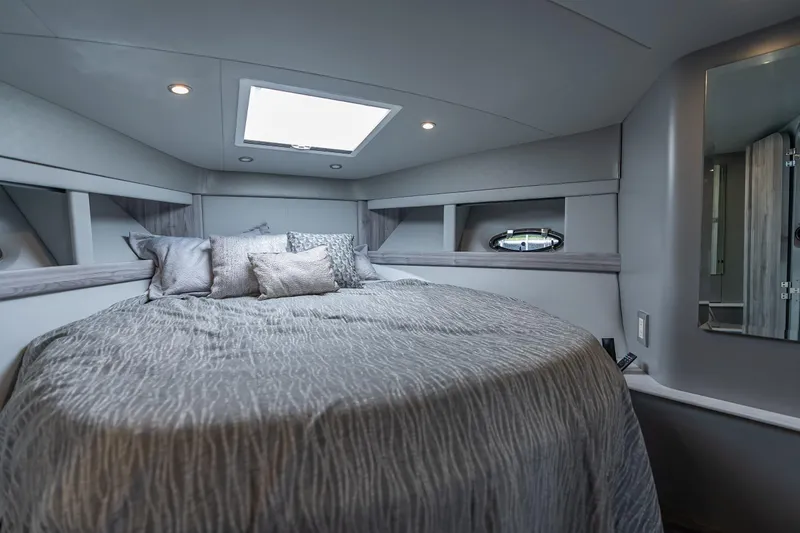 Slide: The Image of Luxurious interior of 2022 Formula 40 Performance Cruiser with elegant bedding and modern design. - 29