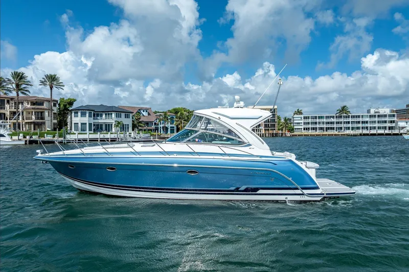 Slide: The Image of 2022 Formula 40 Performance Cruiser on water, with coastal buildings in background. - 7