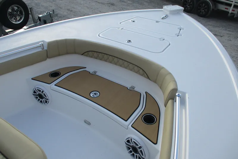 Slide: The Image of 2026 Sportsman Masters 267OE Bay Boat bow with seating and storage compartments. - 13