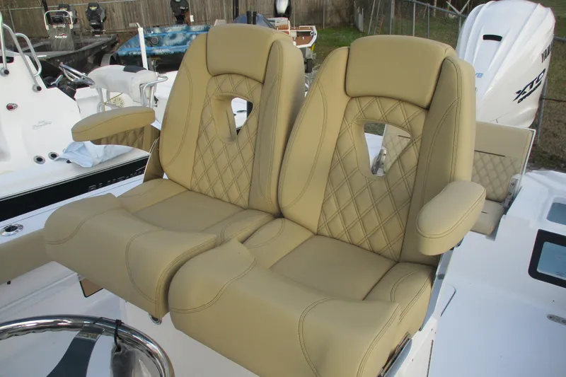 Slide: The Image of Luxurious seating on 2026 Sportsman Masters 267OE Bay Boat with diamond-stitched upholstery. - 19