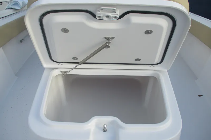 Slide: The Image of Open storage compartment on 2026 Sportsman Masters 267OE Bay Boat. - 5