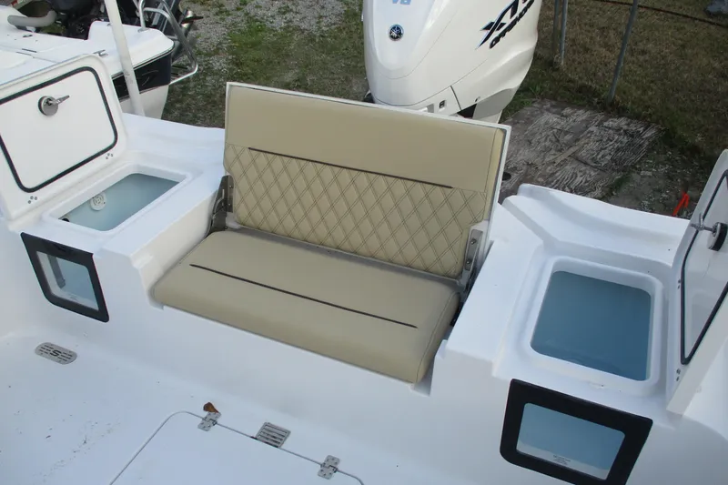 Slide: The Image of 2026 Sportsman Masters 267OE Bay Boat seating and storage compartments. - 7