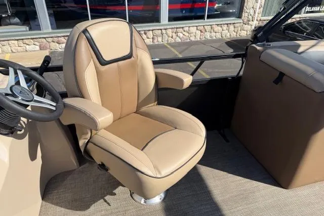 Slide: The Image of Captain's chair in 2022 Viaggio Lago 22U boat, featuring beige upholstery and sleek design. - 14