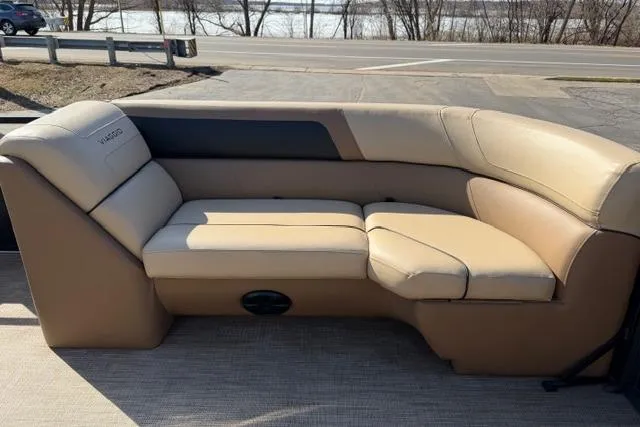 Slide: The Image of Luxurious beige seating on 2022 Viaggio Lago 22U boat, parked near a scenic road. - 20