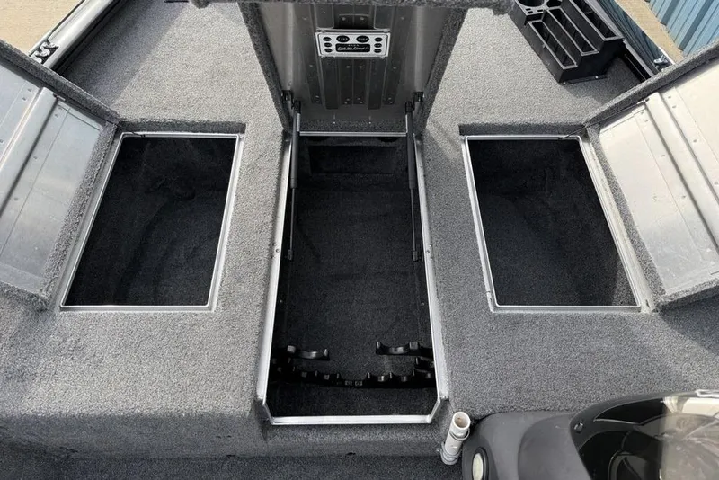 Slide: The Image of 2018 Tracker Pro Team 175 TXW boat storage compartments, open and empty. - 12