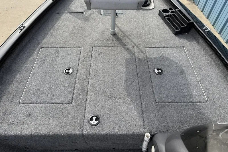 Slide: The Image of 2018 Tracker Pro Team 175 TXW boat deck with storage compartments and seating. - 14