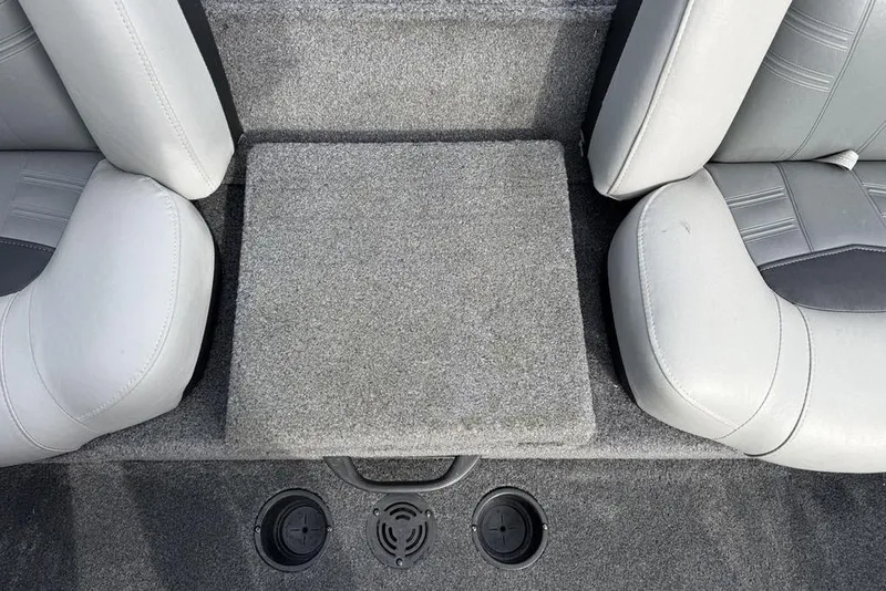 Slide: The Image of 2018 Tracker Pro Team 175 TXW boat interior with gray seating and carpeted flooring. - 16