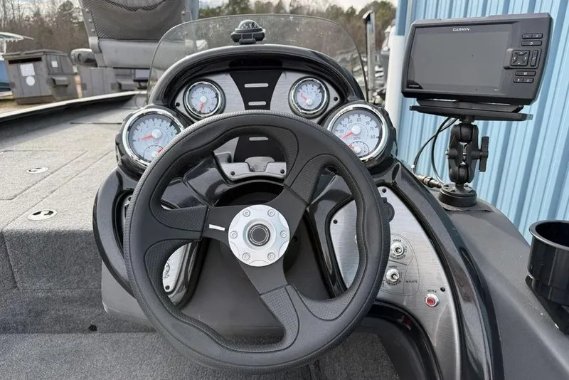 Slide: The Image of 2018 Tracker Pro Team 175 TXW boat dashboard with steering wheel and Garmin GPS. - 20