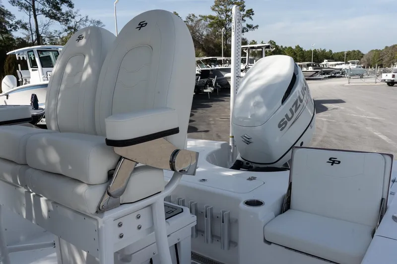 Slide: The Image of 2026 Sea Pro 230 Bay boat with Suzuki outboard engine, featuring comfortable seating. - 10